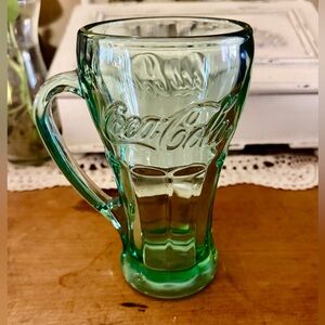 Collectible vintage Libbey Coca-Cola mug, made from heavy, green-tinted glass.